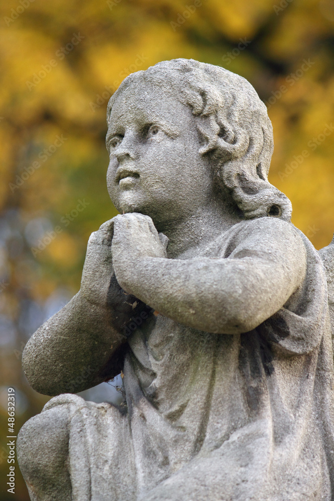 Figure Of A Praying Angel