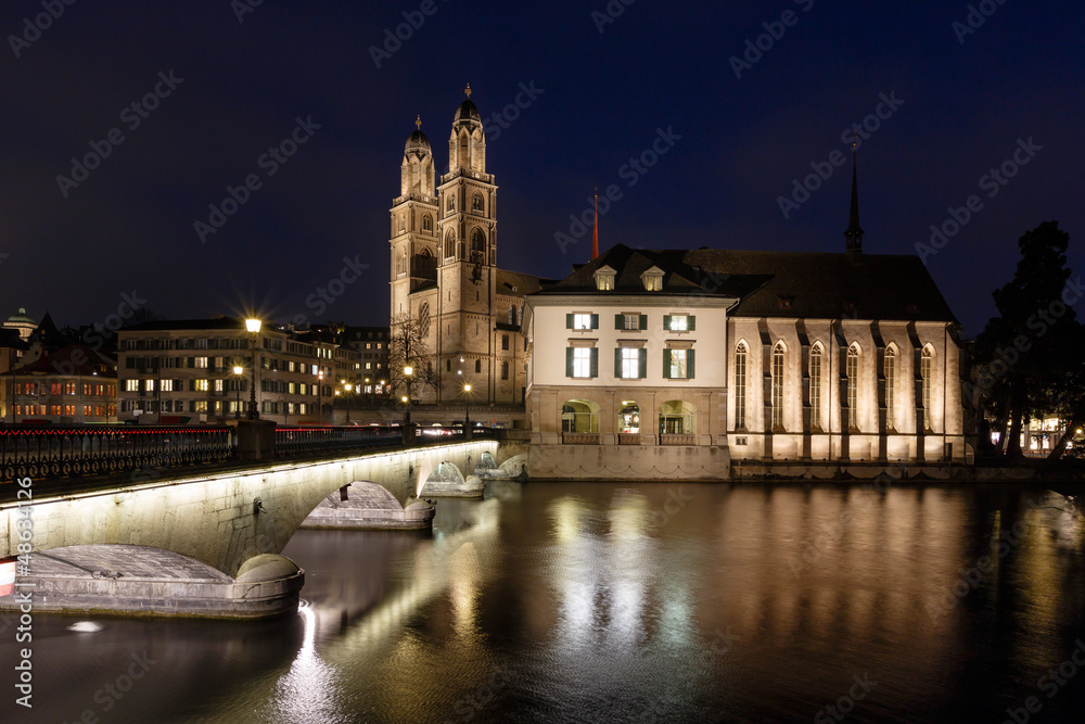 View on Grossmunster Church and Munsterbrucke Bridge in the Even
