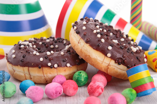 chocolate donuts with carnival decoration