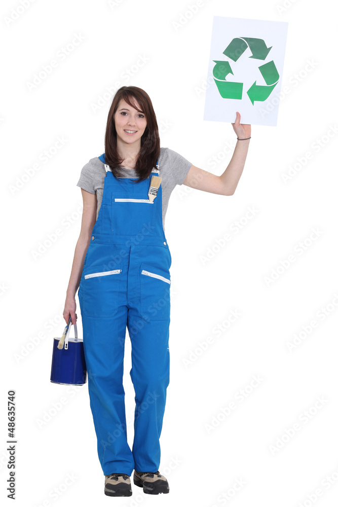 Fototapeta premium Painter holding recycling logo