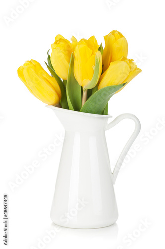 Fototapeta Naklejka Na Ścianę i Meble -  Yellow tulips in a jug
