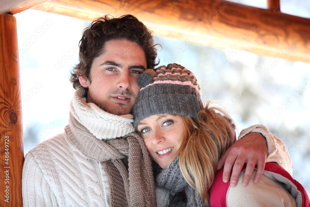 Couple dressed in winter clothing Couple dressed in winter clothing