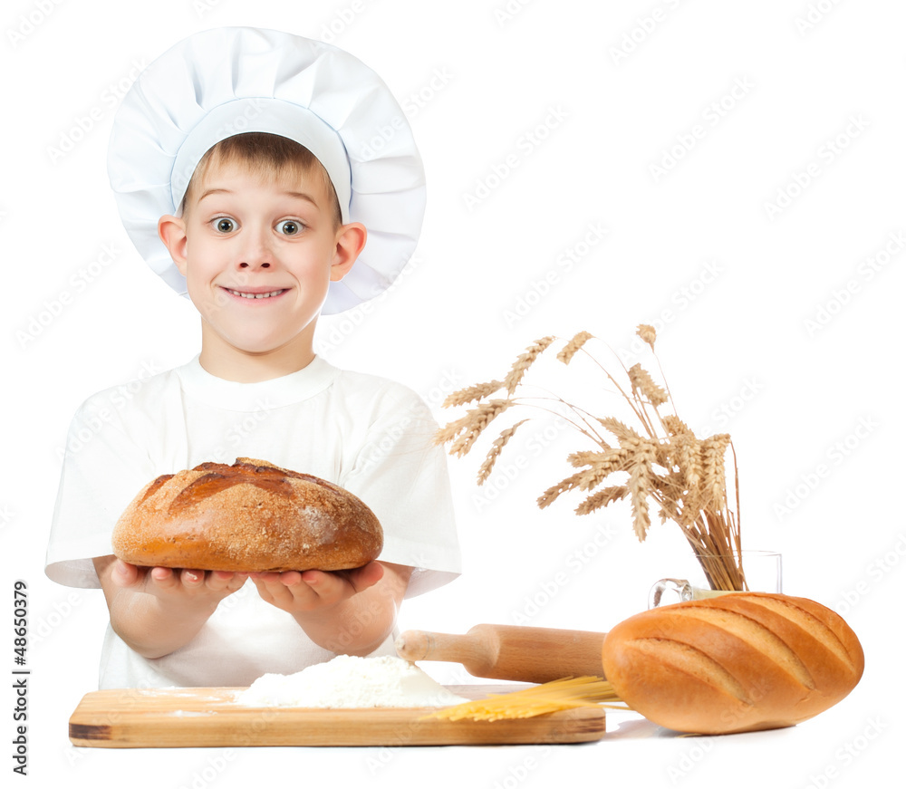 cheerful baker boy with a loaf of rye bread cheerful baker boy with a loaf of rye bread