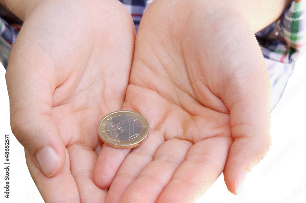 Child's hands  with money on white background