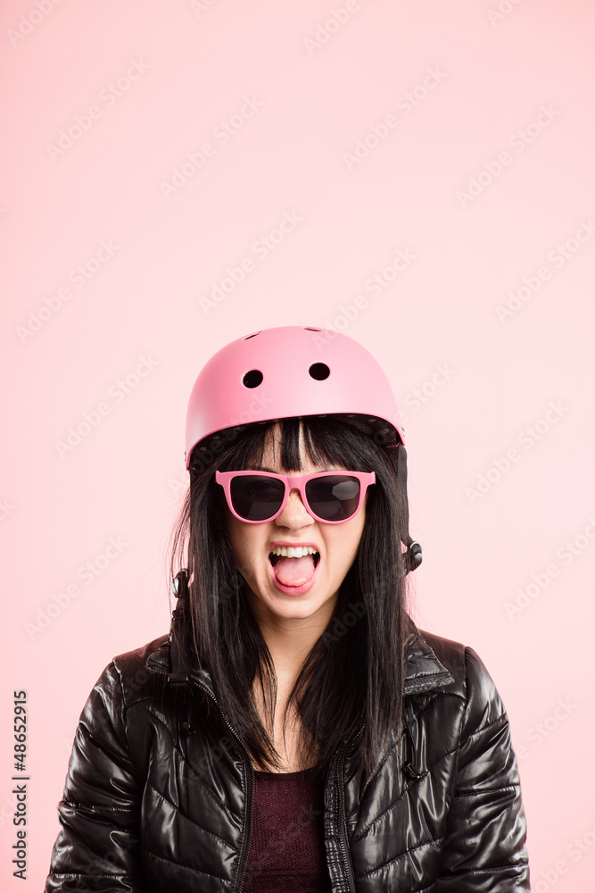 funny woman wearing Cycling Helmet portrait pink background real funny woman wearing Cycling Helmet portrait pink background real