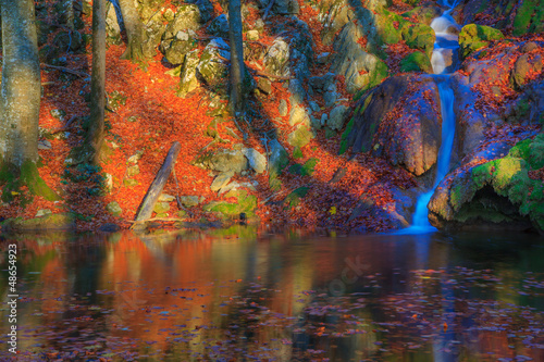 Beautiful autumn foliage  waterfalls and reflection patterns