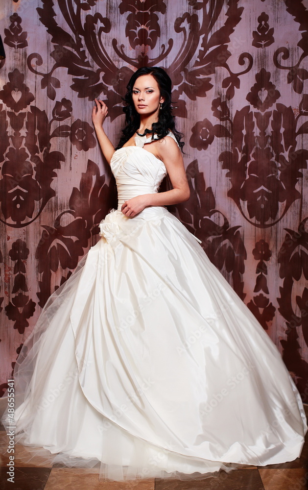 sexy happy bride in white wedding dress in interior sexy happy bride in white wedding dress in interior