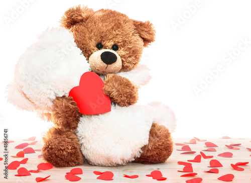 holding a heart in paws bear hugs another bear