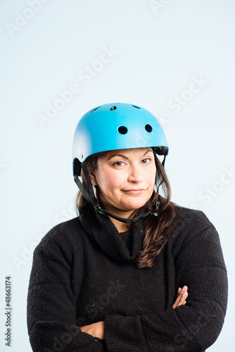 funny woman wearing cycling helmet portrait real people high def