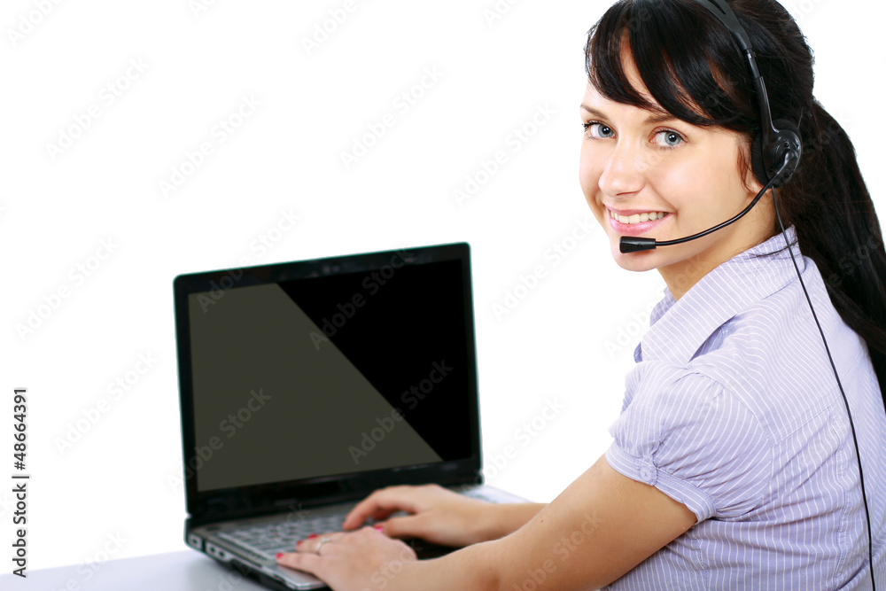 A woman with a laptop and headset A woman with a laptop and headset