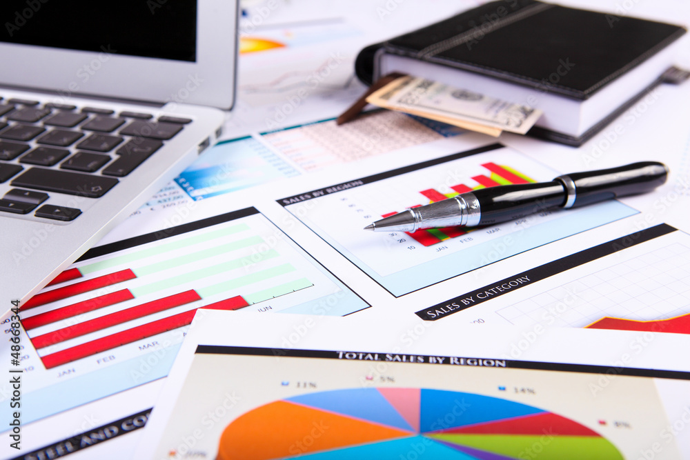 Financial papers on the table Financial papers on the table