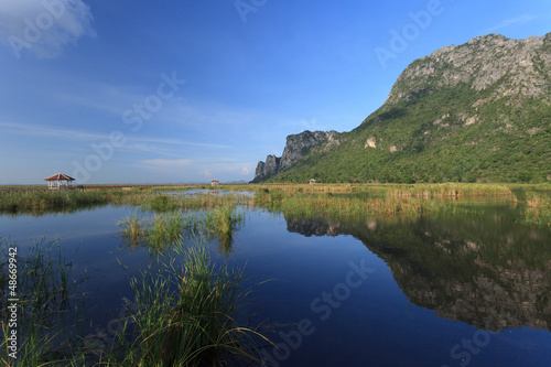 Classic wooden walkway on the lake in national park, Sam Roi Yod