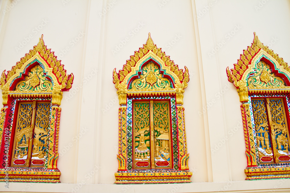 Thai style art on window temple Thai style art on window temple