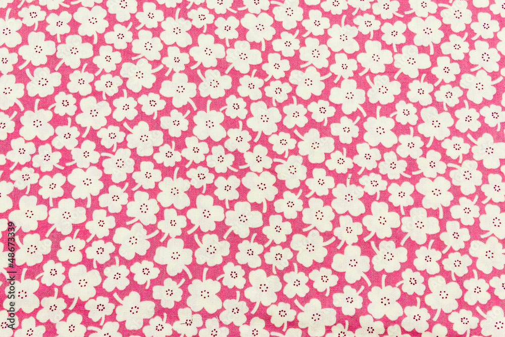 White floral pattern. Flowers fabric on pink White floral pattern. Flowers fabric on pink