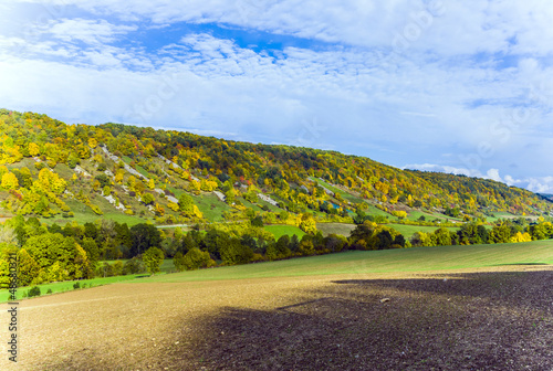 Hills and meadows in the lovely valley photo