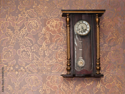 Antique clock on the wall