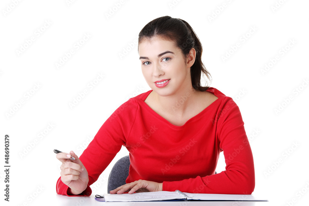 Adult student woman learnig at the desk Adult student woman learnig at the desk