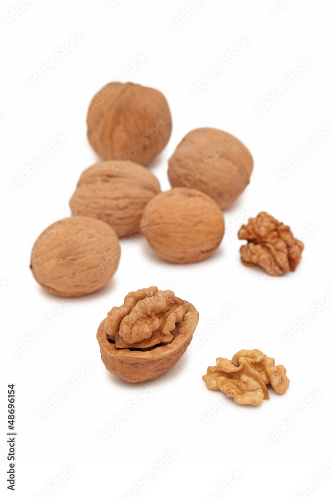 Walnuts on white background (vertical shot) Walnuts on white background (vertical shot)
