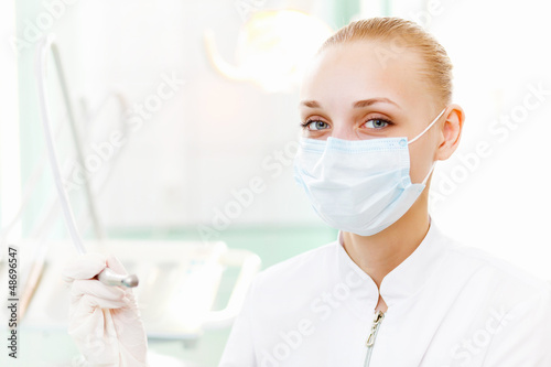 A portrait of a dental worker