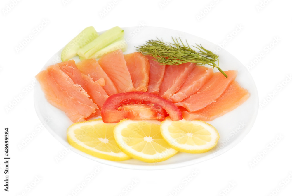 Fresh salmon steak with lemon slice and dill, isolated on white Fresh salmon steak with lemon slice and dill, isolated on white