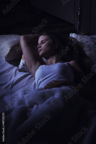 Sensual girl sleeping in the bedroom © Demian