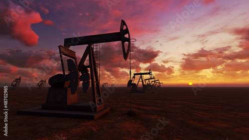 Oil field at sunset