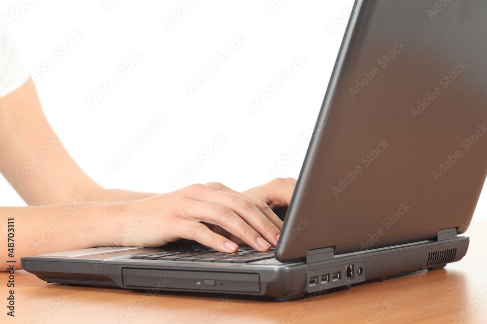 Beautiful woman hands typing on a laptop Beautiful woman hands typing on a laptop