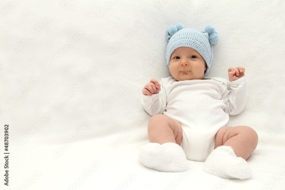 Baby in blue hat Baby in blue hat