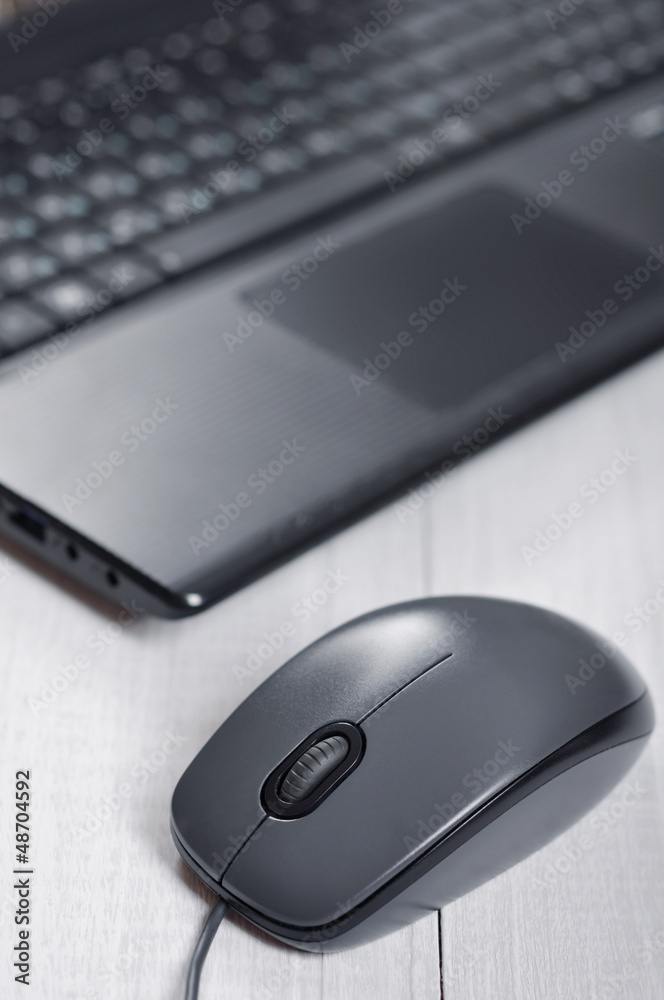 Laptop with computer mouse