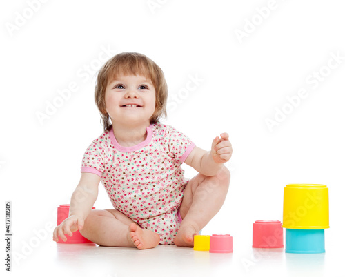 Funny little child is playi...