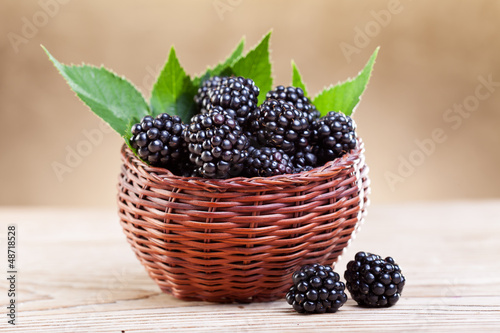 Fresh blackberry in small fruit basket