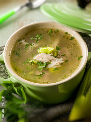 soup with chicken and leek, selective focus