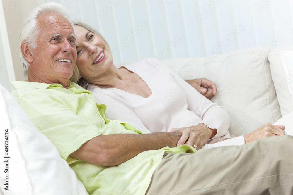Happy Senior Man & Woman Couple Smiling at Home Happy Senior Man & Woman Couple Smiling at Home