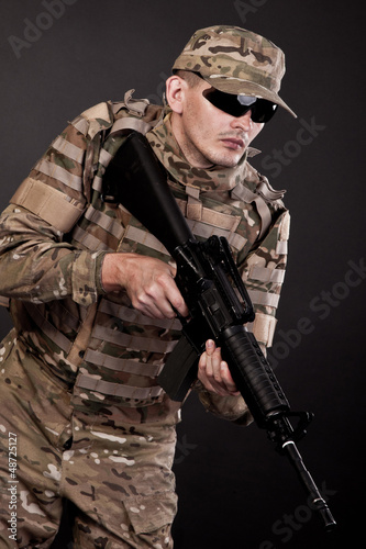 Modern soldier with rifle