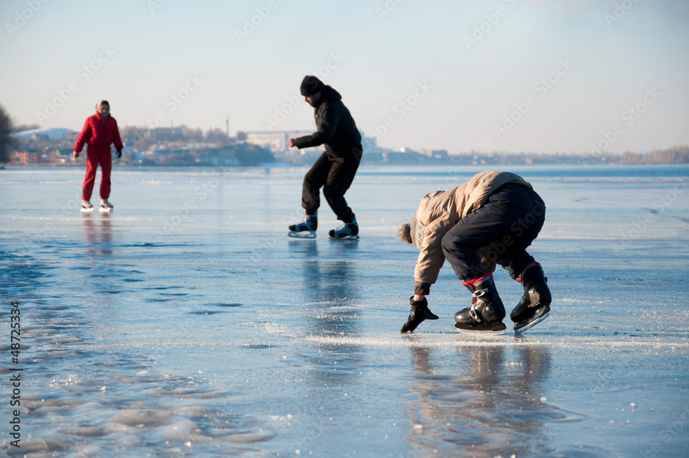 Happy family on ice
