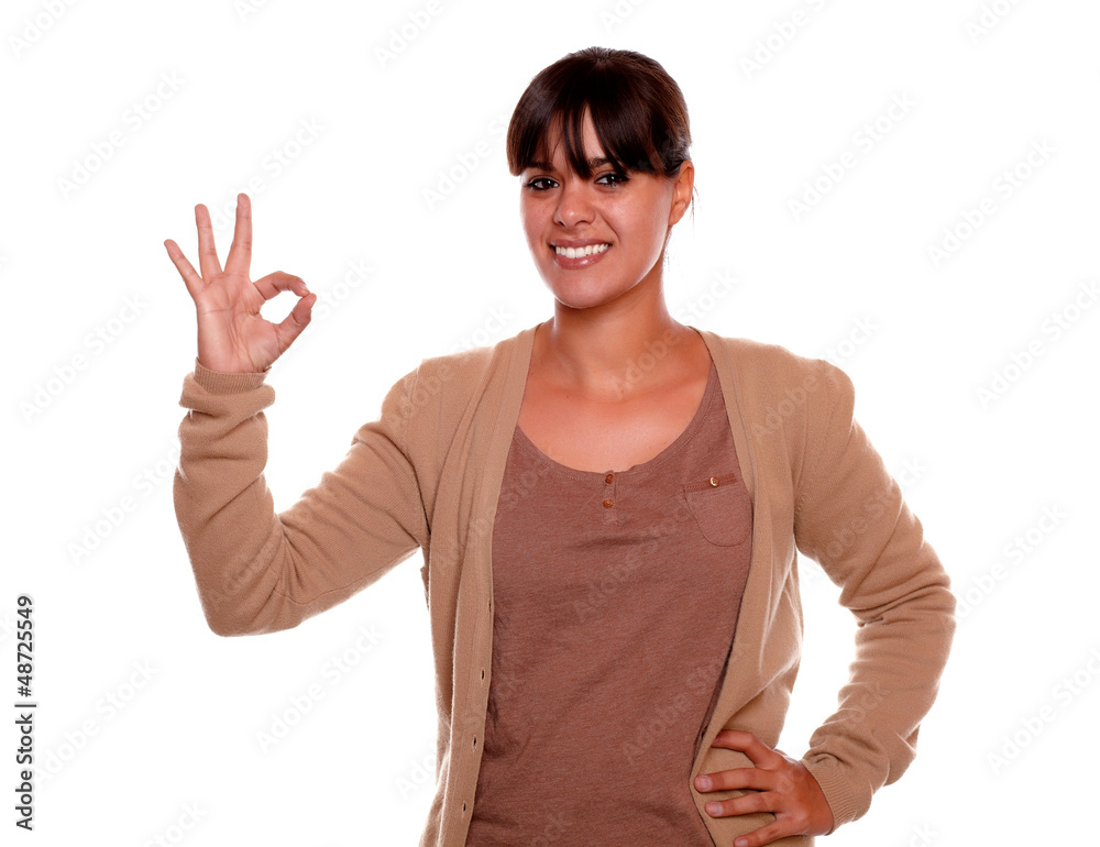 Smiling young woman with fringes saying great job Smiling young woman with fringes saying great job