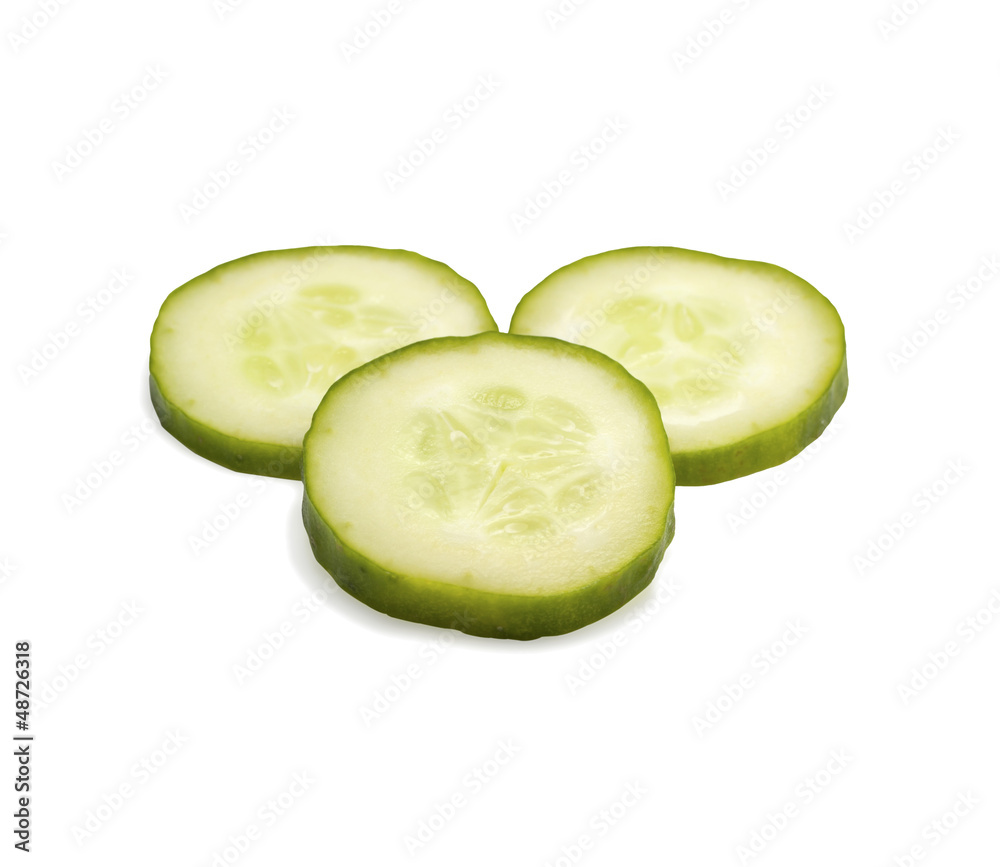 The cucumber cut by circles on a white background The cucumber cut by circles on a white background