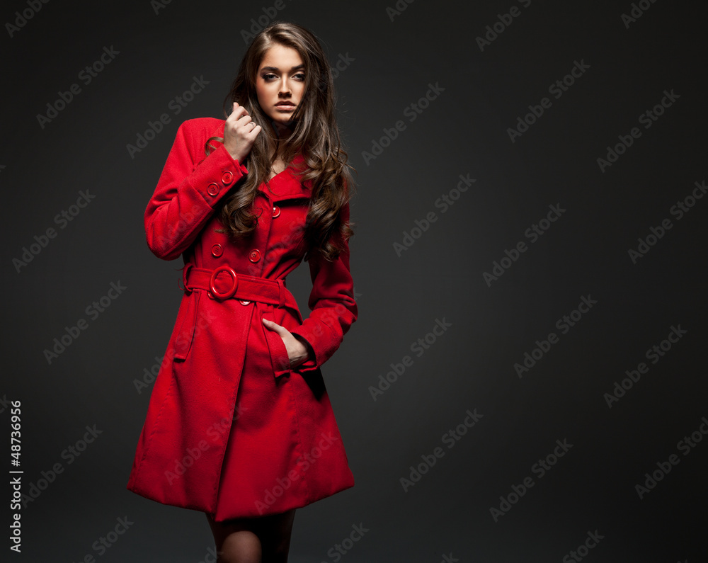 Young woman in a coat for autumn winter fashion Young woman in a coat for autumn winter fashion