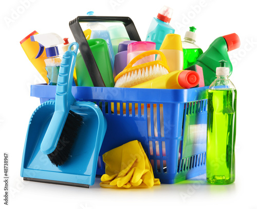 Konstfotografi Shopping basket with detergent bottles isolated on white