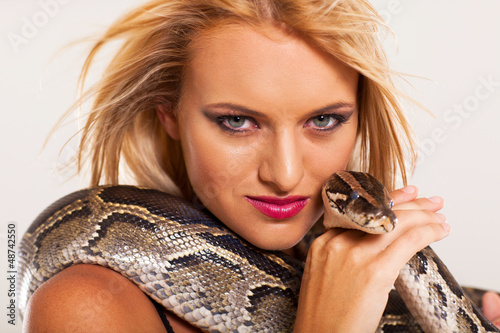 sexy young woman with python