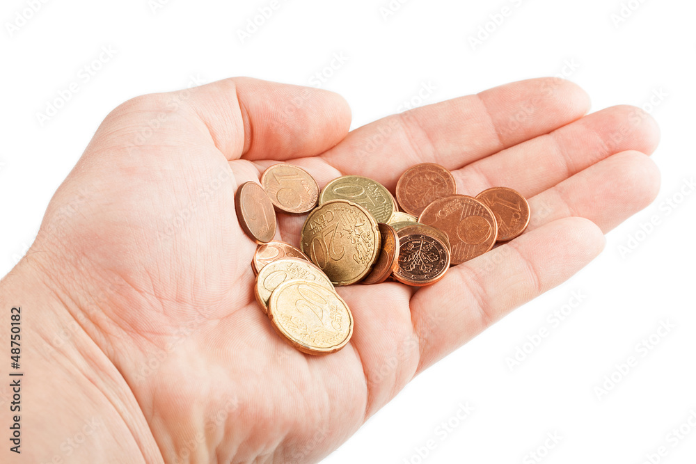 Hand with coins isolated on white background