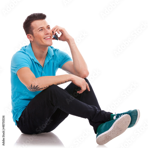 casual man on the phone, sitting