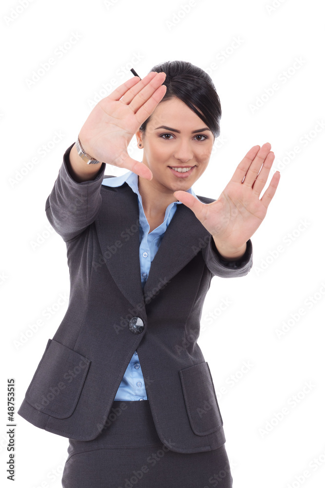 Business woman showing framing hand gesture Business woman showing framing hand gesture