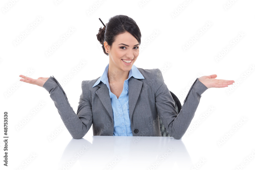 business woman sitting behind desk and welcomming business woman sitting behind desk and welcomming