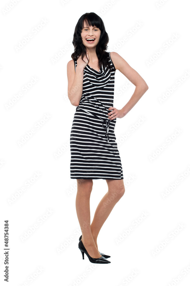Fototapeta premium Gorgeous cheerful woman striking stylish pose