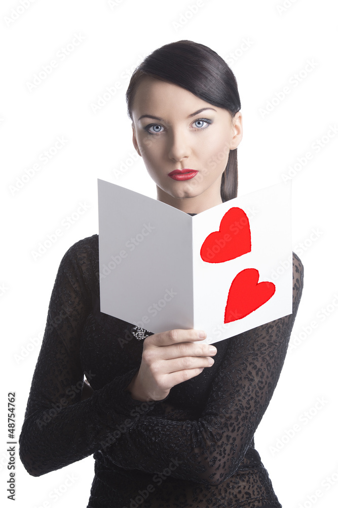 pretty brunette with valentine postcard looks in to the lens pretty brunette with valentine postcard looks in to the lens