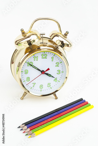 Alarm clock with pencils