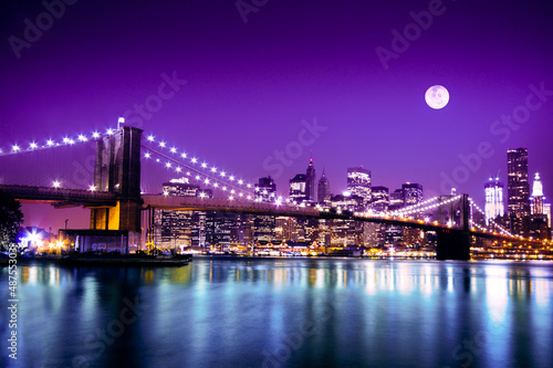 Brooklyn Bridge and NYC skyline with full moon