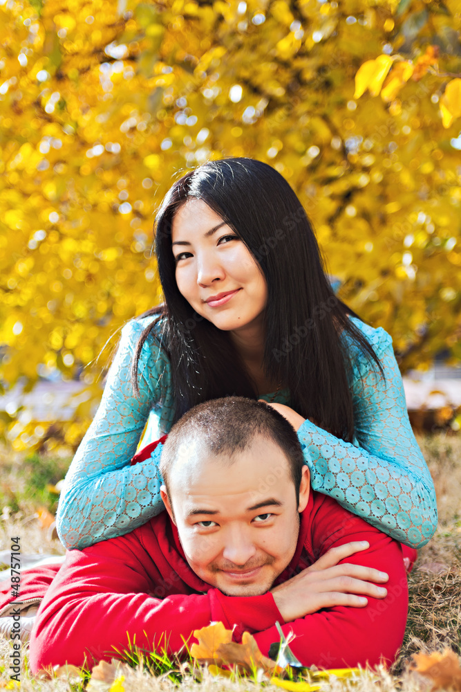 Happy asian couple in love in autumn Happy asian couple in love in autumn