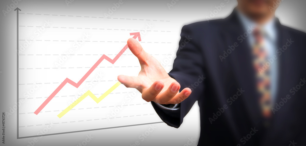 Businessman Holding on the whiteboard, Selective focus on the ha Businessman Holding on the whiteboard, Selective focus on the ha
